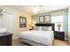 Relaxing bedroom with a comfortable bed, soothing colors, and ample natural light at 1450 Rolling Fairway Dr, Davenport, FL 33896