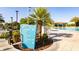 Resort-style pool area with Oasis signage, tiki bar, and inviting landscaping for ultimate relaxation at 1450 Rolling Fairway Dr, Davenport, FL 33896