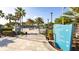Beautiful pool area with palm trees and lounge chairs creating a perfect setting for relaxation at 1450 Rolling Fairway Dr, Davenport, FL 33896