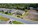 An aerial view showcases a well-maintained home and its attractive location at 1568 Cordgrass Way, Lakeland, FL 33813
