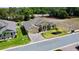 An aerial shot captures a beautiful home with lovely landscaping in a desirable location at 1568 Cordgrass Way, Lakeland, FL 33813