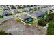 Aerial view of a home with a screened pool and a spacious backyard in a quiet neighborhood at 1568 Cordgrass Way, Lakeland, FL 33813