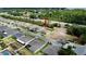 An aerial shot features a beautiful home in a peaceful neighborhood with lush surroundings at 1568 Cordgrass Way, Lakeland, FL 33813