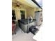 Inviting hot tub with steps and grab bar, adjacent to a patio and offering an outdoor spa experience at 1568 Cordgrass Way, Lakeland, FL 33813