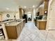 Galley-style kitchen showcasing granite countertops and stainless steel appliances at 1568 Cordgrass Way, Lakeland, FL 33813