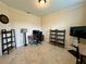 Versatile office space features a desk, shelving, and a large window at 1568 Cordgrass Way, Lakeland, FL 33813