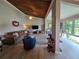 Open living space with vaulted ceilings and water views at 200 Maitland Ave # 114, Altamonte Springs, FL 32701
