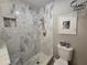Stylish tiled shower with built-in niche and modern showerhead fixture at 200 Maitland Ave # 114, Altamonte Springs, FL 32701