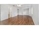 Spacious bedroom showcasing hardwood floors, large closets, and adjoining bathroom at 2899 Sw 66 St, Ocala, FL 34476