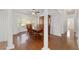 Formal dining room with wood floors, natural light, and traditional furnishings at 2899 Sw 66 St, Ocala, FL 34476