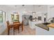 Stylish kitchen featuring stainless steel appliances, granite countertops, and a breakfast table at 2899 Sw 66 St, Ocala, FL 34476