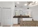 Modern kitchen boasting stainless steel appliances, granite counters, and ample cabinet space at 2899 Sw 66 St, Ocala, FL 34476