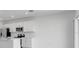 Bright kitchen featuring white cabinetry, stainless appliances, an island with sink, and natural light at 5133 Forget Me Not Ave, Lake Hamilton, FL 33851