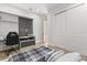 Modern bedroom with desk and drawers and a large closet at 1521 Chestnut Ave, Winter Park, FL 32789