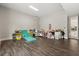 Bright bonus room with wood floors, ample storage, and versatile space for various activities at 1521 Chestnut Ave, Winter Park, FL 32789