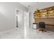 Home office area featuring a built-in desk, shelving, and a minimalist design at 1521 Chestnut Ave, Winter Park, FL 32789