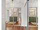 Stylish bathroom featuring double closets and a neutral color scheme at 2049 Se 37Th Court Cir, Ocala, FL 34471