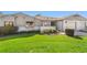 Charming home with a well-manicured lawn and landscaped front yard at 2049 Se 37Th Court Cir, Ocala, FL 34471