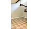 Bright room with patterned floor, ceiling fan, and large windows at 5127 Eaglesmere Dr # A02, Orlando, FL 32819