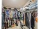 Walk-in closet with ample hanging space, shelving, and storage for clothes and accessories, offering great organization at 3905 Westerham Dr, Clermont, FL 34711