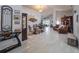 Spacious living room with tile floors connecting the dining area and comfortable seating arrangement at 3905 Westerham Dr, Clermont, FL 34711