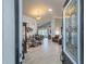 Open-concept living space featuring tile floors, dining area, and comfortable seating at 3905 Westerham Dr, Clermont, FL 34711