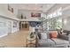 Inviting lounge area with comfortable seating, natural light, and stylish decor at 3905 Westerham Dr, Clermont, FL 34711
