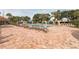 Resort-style community pool with ample seating and lush landscaping for relaxation and recreation at 3905 Westerham Dr, Clermont, FL 34711