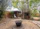Backyard featuring a fire pit, boxing equipment, and tree house at 4209 Forrestal Ave, Orlando, FL 32806