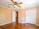 The bedroom features hardwood floors, a closet, and an open doorway at 4209 Forrestal Ave, Orlando, FL 32806