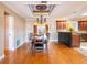 Elegant dining area with hardwood floors, decorative ceiling, and dining table at 4209 Forrestal Ave, Orlando, FL 32806