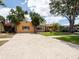 Charming single-story home featuring a well-maintained front yard and long driveway at 4209 Forrestal Ave, Orlando, FL 32806