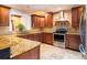 Modern kitchen with granite countertops, stainless steel appliances, and ample cabinet space at 4209 Forrestal Ave, Orlando, FL 32806
