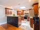 Well-equipped kitchen featuring granite countertops, stainless steel appliances, and custom cabinetry at 4209 Forrestal Ave, Orlando, FL 32806