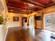 A spacious living room features hardwood floors and french doors that leads to the deck at 4209 Forrestal Ave, Orlando, FL 32806