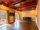 Inviting living room with rich wood floors, decorative ceiling, and outdoor access at 4209 Forrestal Ave, Orlando, FL 32806