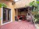 Outdoor patio featuring lounge seating, hammock, and wood flooring at 4209 Forrestal Ave, Orlando, FL 32806