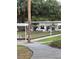 Bocce ball court with shaded seating areas and pathways for easy access at 17430 Se 110Th Ter, Summerfield, FL 34491