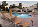 Community pool with plenty of chairs and tables at 17430 Se 110Th Ter, Summerfield, FL 34491