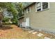 This home features a quaint backyard and lovely neutral exterior paint at 2508 Yale Ave, Sanford, FL 32773