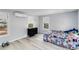 Bright bedroom with ample natural light, light wood floors, and a functional layout at 2508 Yale Ave, Sanford, FL 32773