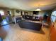Inviting Gathering room with a fireplace, creating a cozy atmosphere perfect for relaxation and entertainment at 1818 Mango Tree Dr, Edgewater, FL 32132