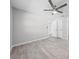 Spacious bedroom showcasing a contemporary ceiling fan and light-colored laminate flooring at 219 Vermont Ave, St Cloud, FL 34769