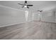 Spacious living room featuring hard surface floors and an open floor plan at 219 Vermont Ave, St Cloud, FL 34769
