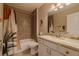 Bathroom features tiled shower-tub, white marble sink, and neutral paint at 9085 Sw 202Nd Avenue Rd, Dunnellon, FL 34431