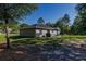 Fenced backyard with patio area and well-maintained lawn; providing privacy and space at 9085 Sw 202Nd Avenue Rd, Dunnellon, FL 34431