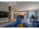 Open concept floor plan with a view of the living room, dining room, and kitchen at 9085 Sw 202Nd Avenue Rd, Dunnellon, FL 34431