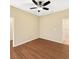 Bright bedroom features a ceiling fan and wood-look laminate flooring at 2960 Boating Blvd, Kissimmee, FL 34746