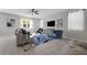 Modern living room featuring comfortable seating, stylish decor, and plenty of natural light at 2960 Boating Blvd, Kissimmee, FL 34746