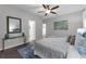 Comfortable bedroom with ceiling fan, modern decor and stylish accents at 2960 Boating Blvd, Kissimmee, FL 34746